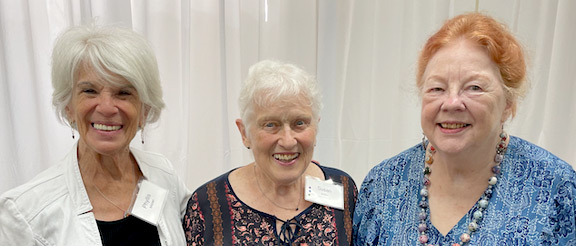 Margaret Huyck (at right) celebrated the 10th anniversary of Hyde Park Village with fellow village organizers Phyllis Mitzen, a founding member of Skyline Village Chicago and Sounds Good singer, and Susan Alitto, founding president of Hyde Park Village.